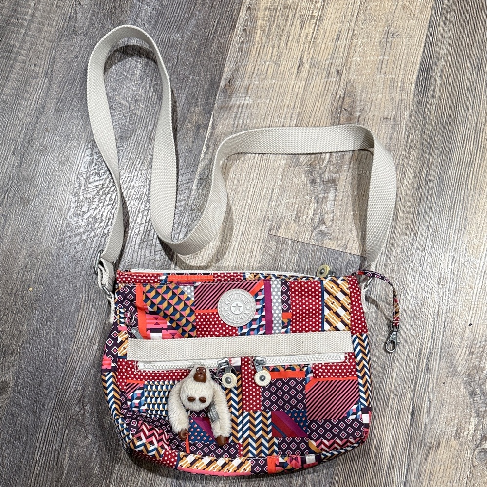 Kipling Multicolor Geometric Patch Crossbody with Cream Strap and Monkey Charm